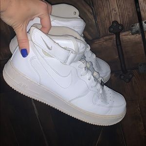 High top women’s Nike Air Force 1s